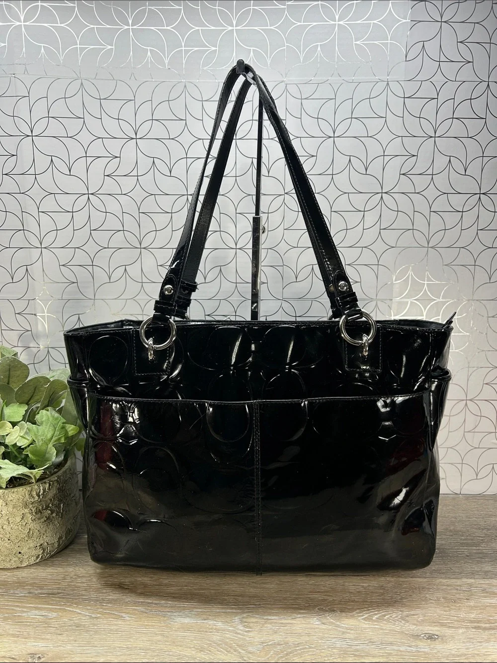 Coach black patent leather zip top tote bag